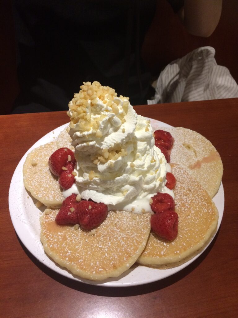 strawberry and cream and macadamia nut pancakes.